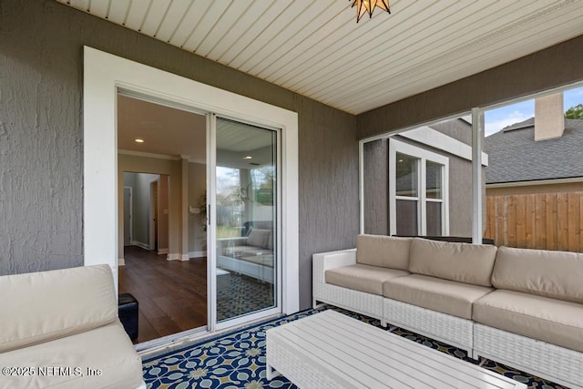 wooden deck featuring outdoor lounge area