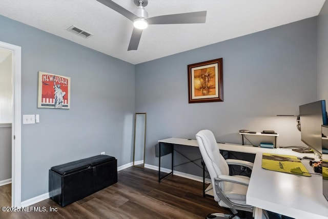 office area with ceiling fan and dark hardwood / wood-style floors