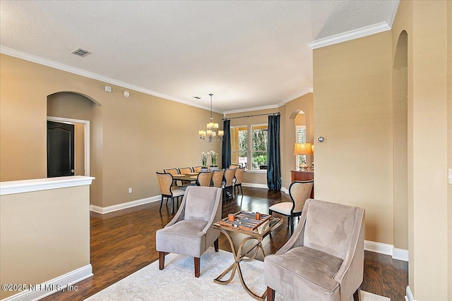 721 W Kings College Dr, Saint Johns, FL 32259 - dining space with dark hardwood / wood-style flooring, a notable chandelier, and ornamental molding