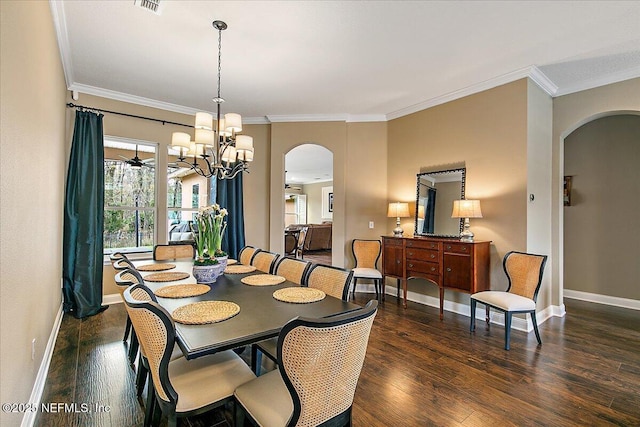 721 W Kings College Dr, Saint Johns, FL 32259 - dining area featuring crown molding, dark hardwood / wood-style floors, and an inviting chandelier