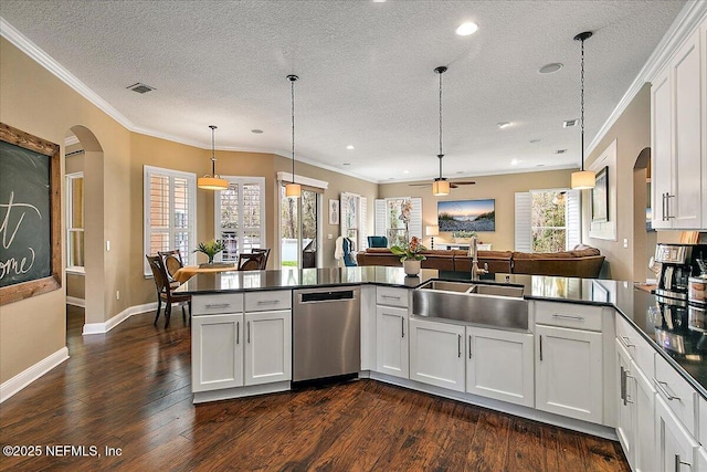 721 W Kings College Dr, Saint Johns, FL 32259 - kitchen with white cabinetry, sink, decorative light fixtures, and dishwasher