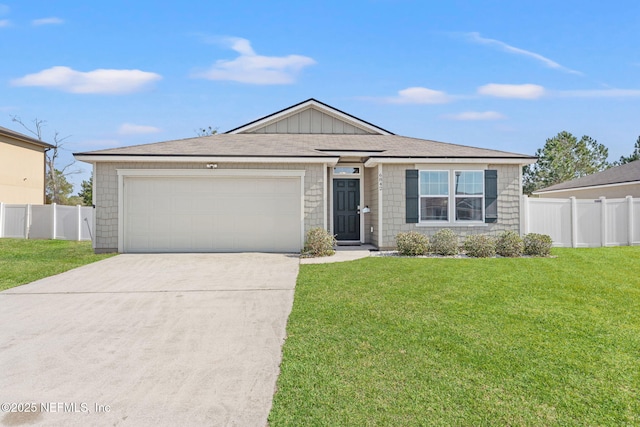 single story home featuring a garage and a front lawn