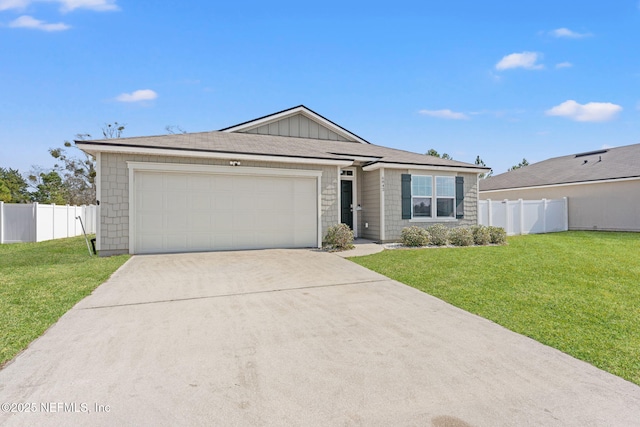 ranch-style house with a garage and a front yard