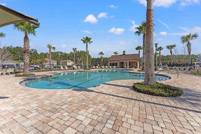 view of pool featuring a patio area