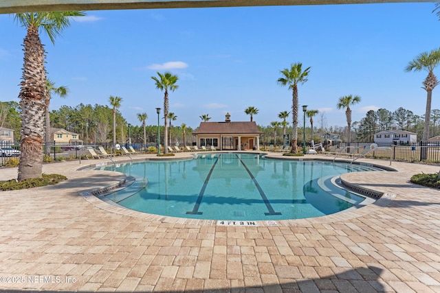 view of swimming pool with a patio