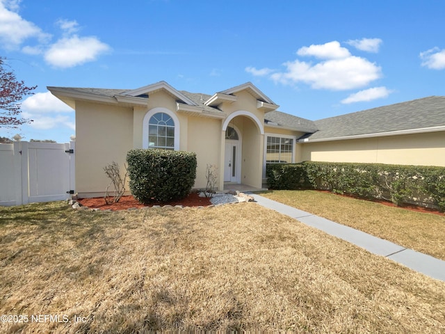 view of front of home with a front yard