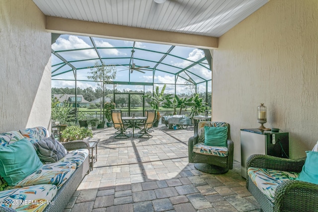 view of patio with a lanai and an outdoor living space