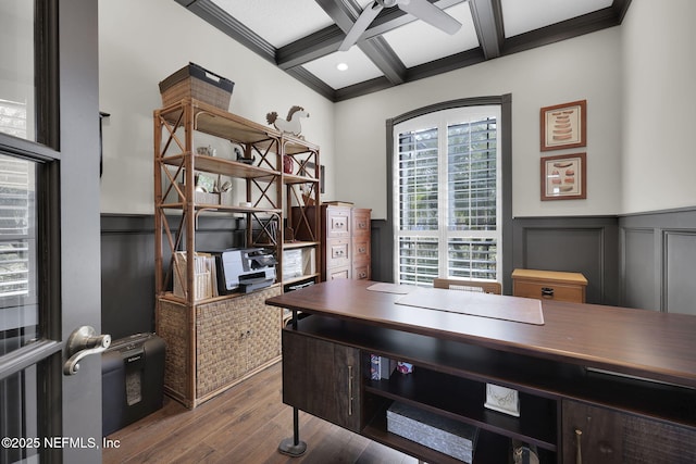 office featuring coffered ceiling, crown molding, wood-type flooring, ceiling fan, and beam ceiling