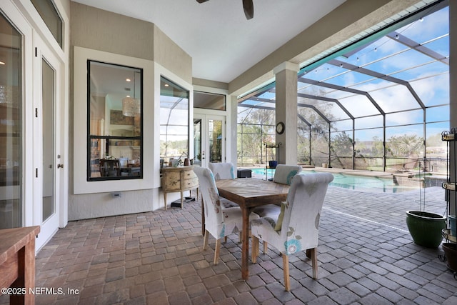 sunroom / solarium with ceiling fan