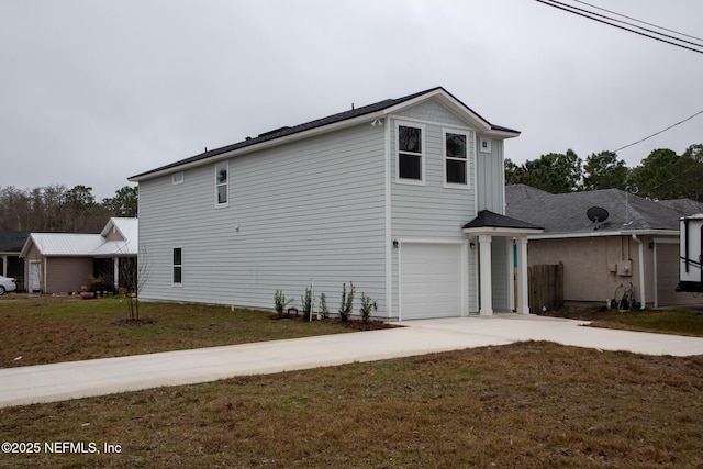 view of property exterior featuring a garage and a lawn