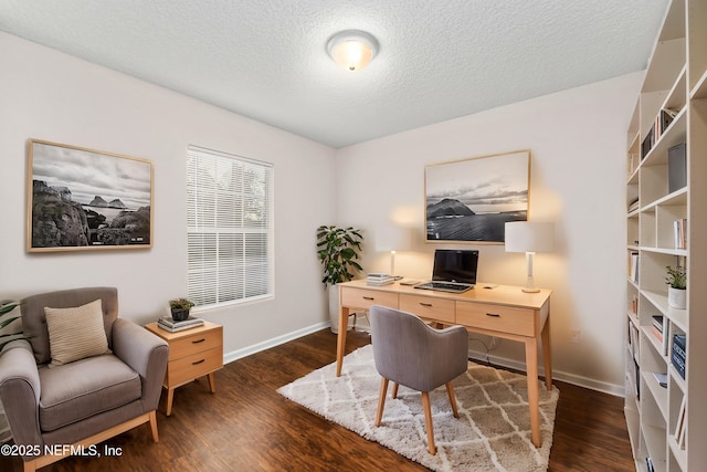 office featuring dark wood-type flooring and a textured ceiling