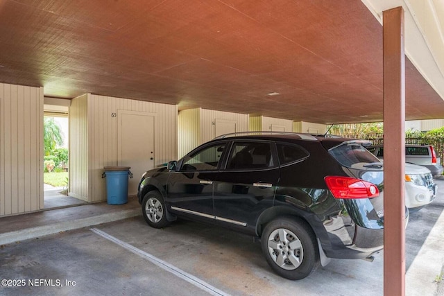 10154 Leisure Ln N Unit 22, Jacksonville, FL 32256 - view of parking with a carport