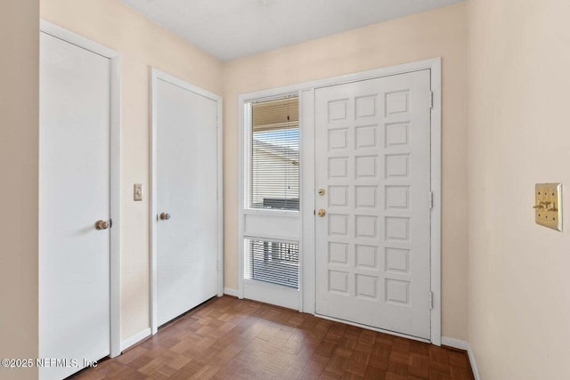10154 Leisure Ln N Unit 22, Jacksonville, FL 32256 - entryway featuring dark parquet floors