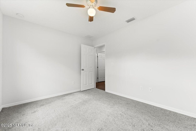 unfurnished room featuring carpet flooring and ceiling fan