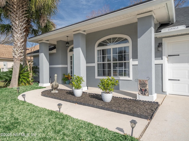 doorway to property featuring a garage