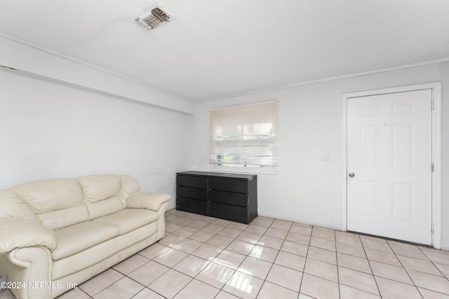 living room featuring light tile patterned flooring