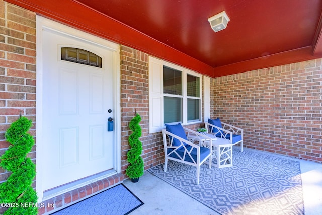 property entrance featuring covered porch