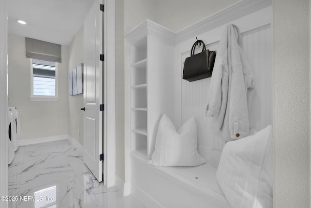 bathroom with washing machine and dryer