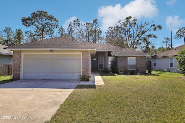 single story home featuring a garage and a front yard