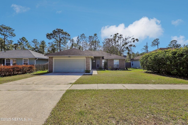 ranch-style home with a garage and a front lawn