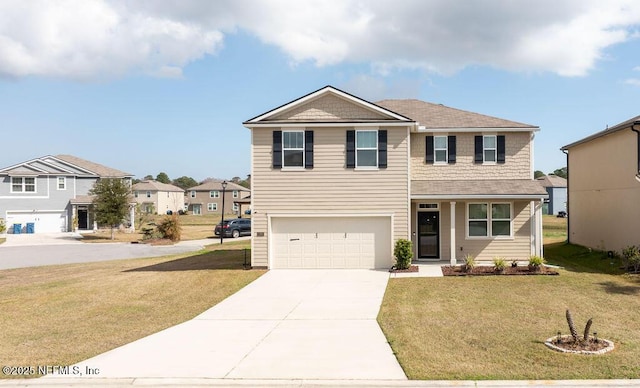 view of front of property featuring a garage and a front lawn