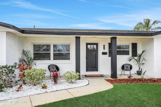 property entrance with a porch