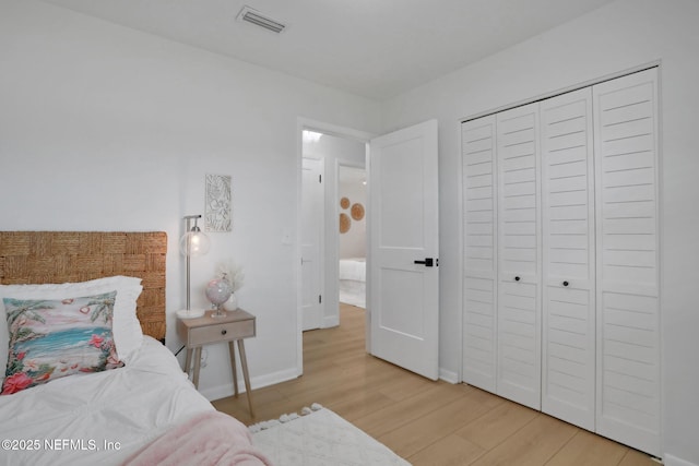 bedroom featuring light hardwood / wood-style floors