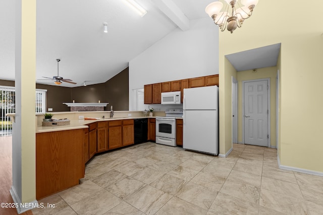 kitchen with ceiling fan with notable chandelier, sink, white appliances, kitchen peninsula, and beam ceiling