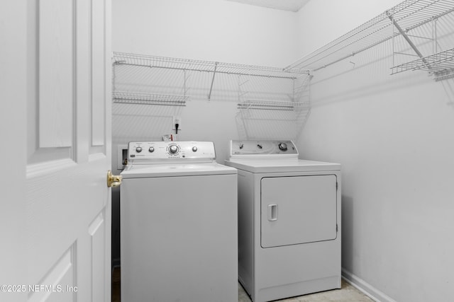 laundry area featuring washer and clothes dryer