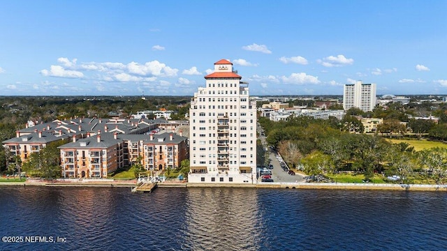 birds eye view of property featuring a water view