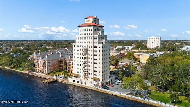 birds eye view of property featuring a water view