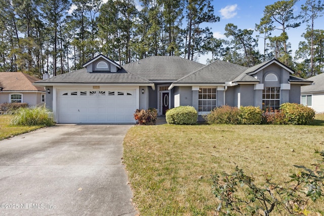 ranch-style house with a garage and a front yard