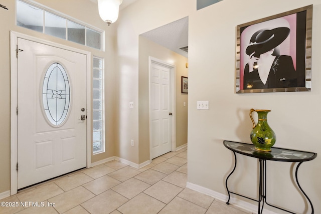 tiled entrance foyer with plenty of natural light