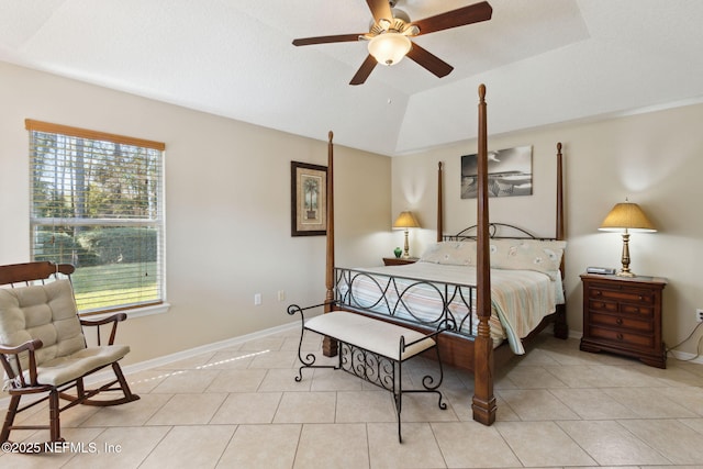 tiled bedroom with vaulted ceiling and ceiling fan