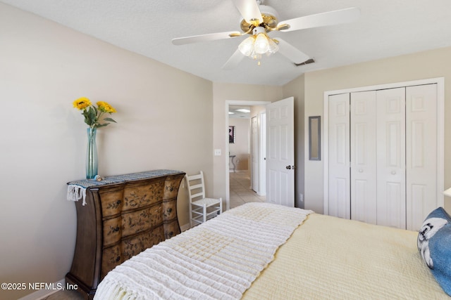 bedroom with a closet and ceiling fan