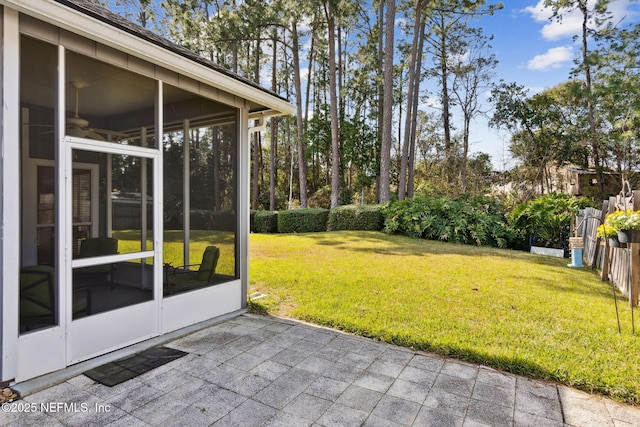 view of yard featuring a sunroom