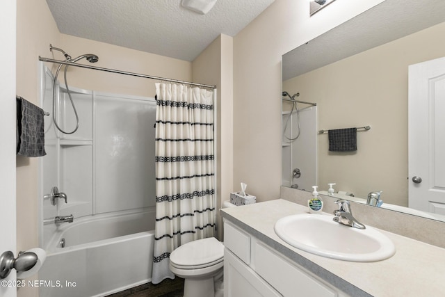 full bathroom featuring vanity, toilet, shower / tub combo, and a textured ceiling