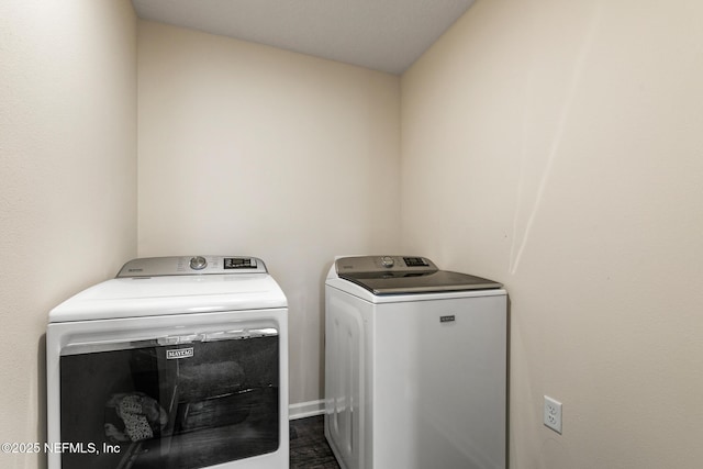 laundry room with washer and clothes dryer