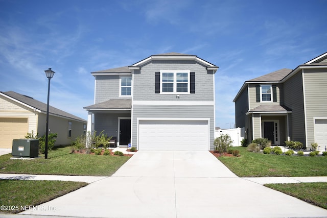 2271 Willow Glen Ln, Green Cove Springs, FL 32043 - traditional home featuring an attached garage, a front yard, and driveway