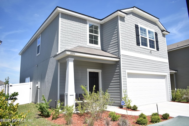 2271 Willow Glen Ln, Green Cove Springs, FL 32043 - view of front of house featuring a garage, fence, and driveway