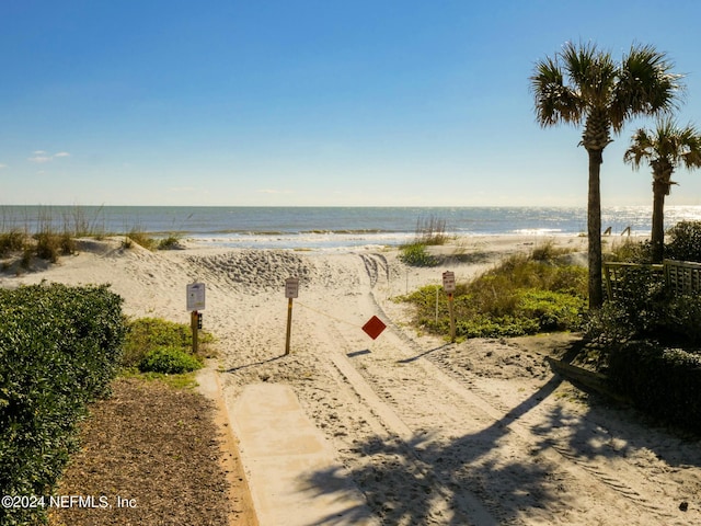 view of water feature with a beach view