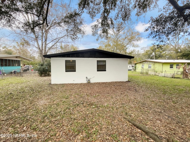 exterior space with a lawn