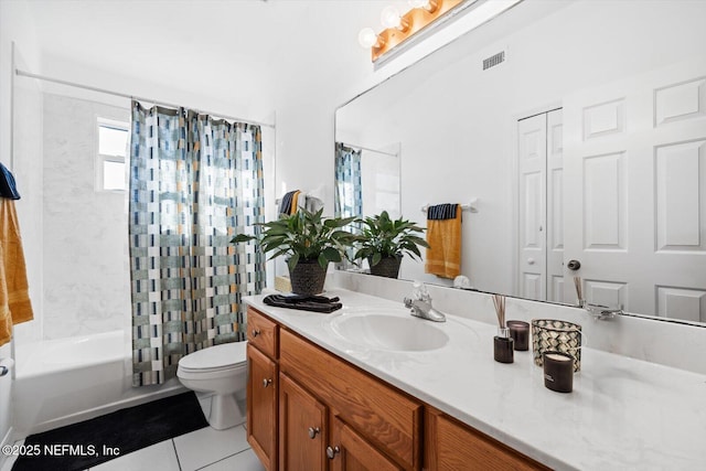 full bathroom with vanity, tile patterned floors, toilet, and shower / tub combo with curtain