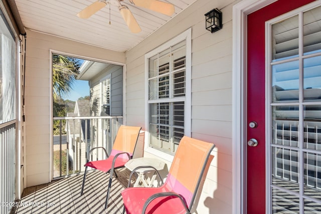 exterior space with ceiling fan