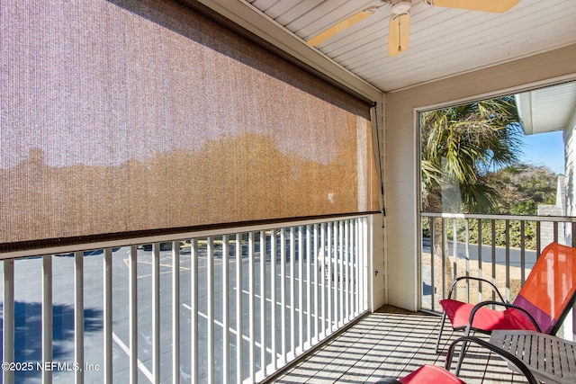 balcony featuring ceiling fan