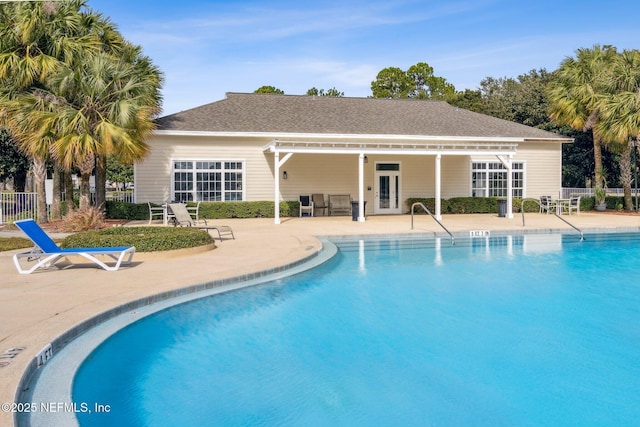 view of swimming pool with a patio area