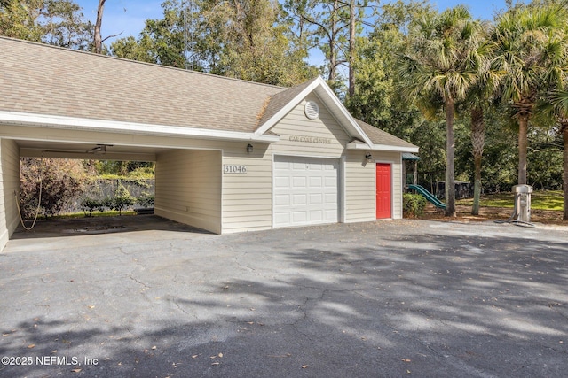 garage with a carport