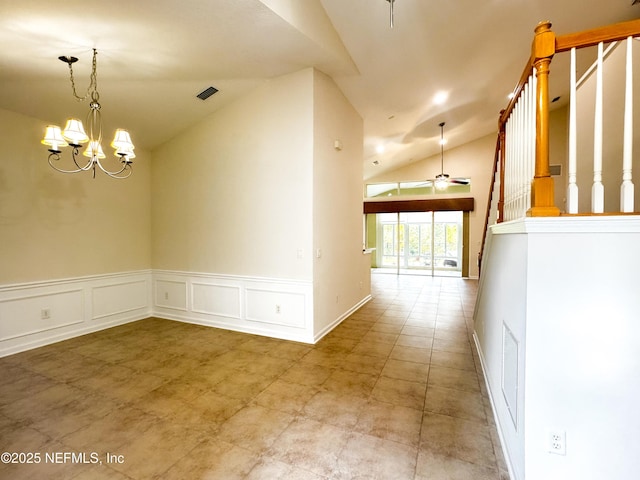 interior space with vaulted ceiling and ceiling fan with notable chandelier