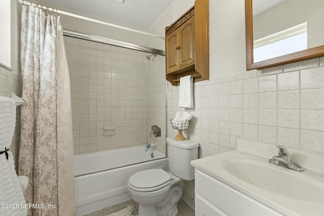 full bathroom featuring vanity, tile walls, toilet, and shower / bath combination with curtain