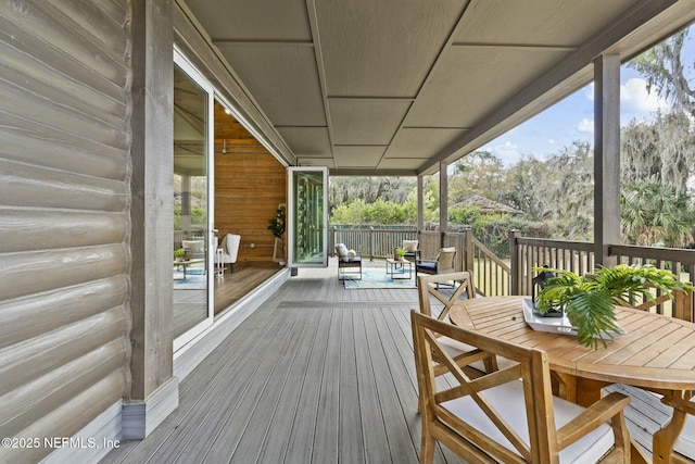 deck featuring outdoor dining space